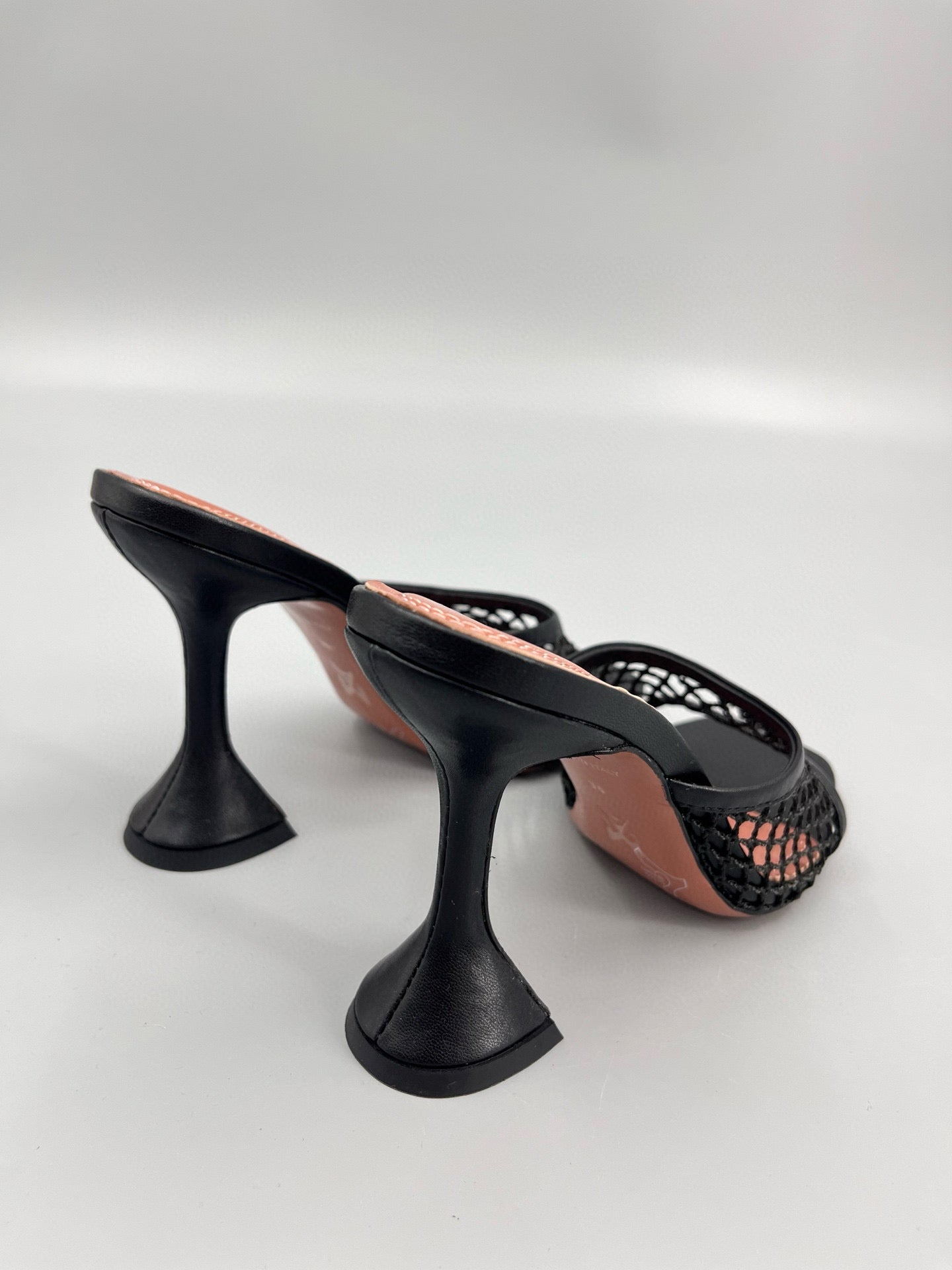 AMINA M HEELS