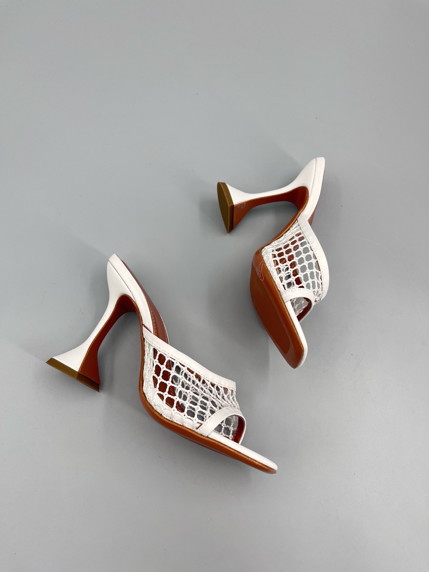 AMINA M HEELS