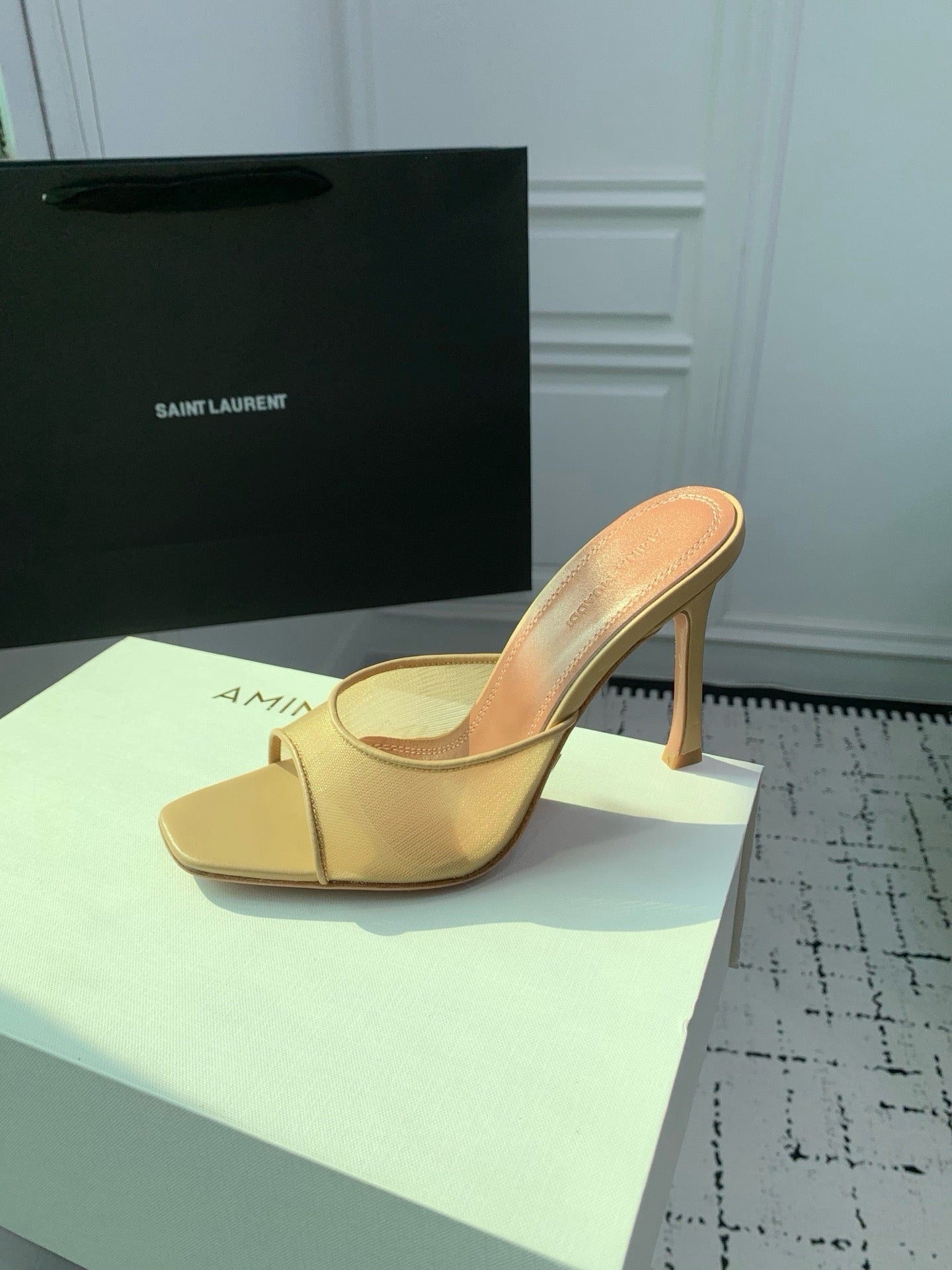 AMINA M HEELS