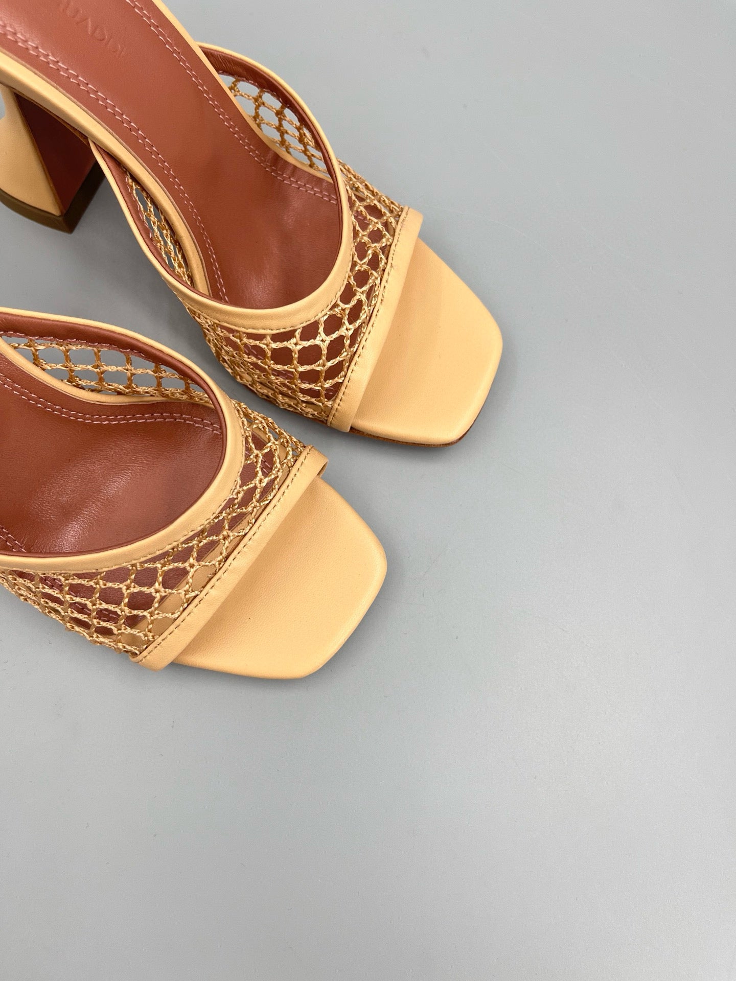 AMINA M HEELS