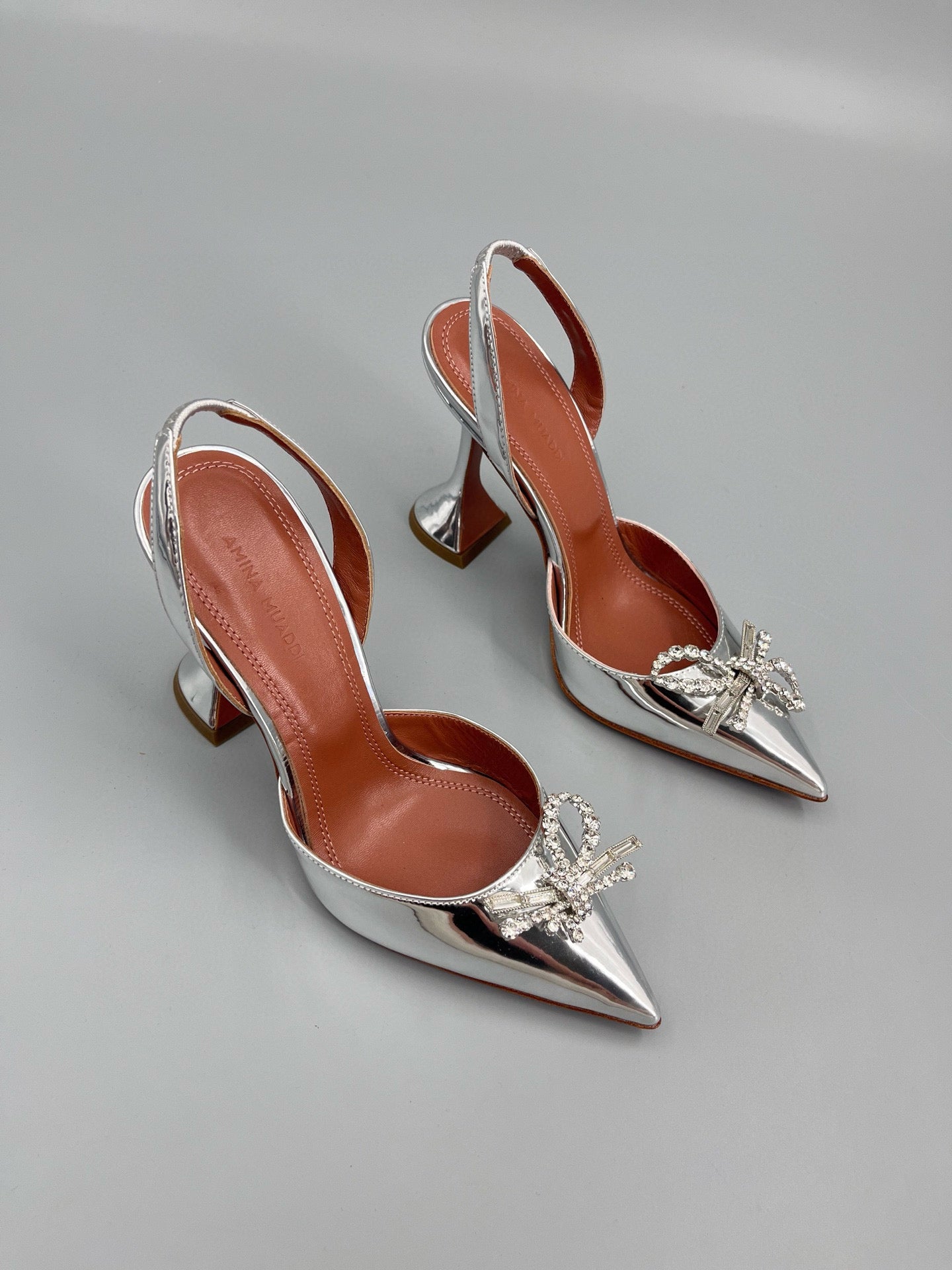 AMINA M HEELS