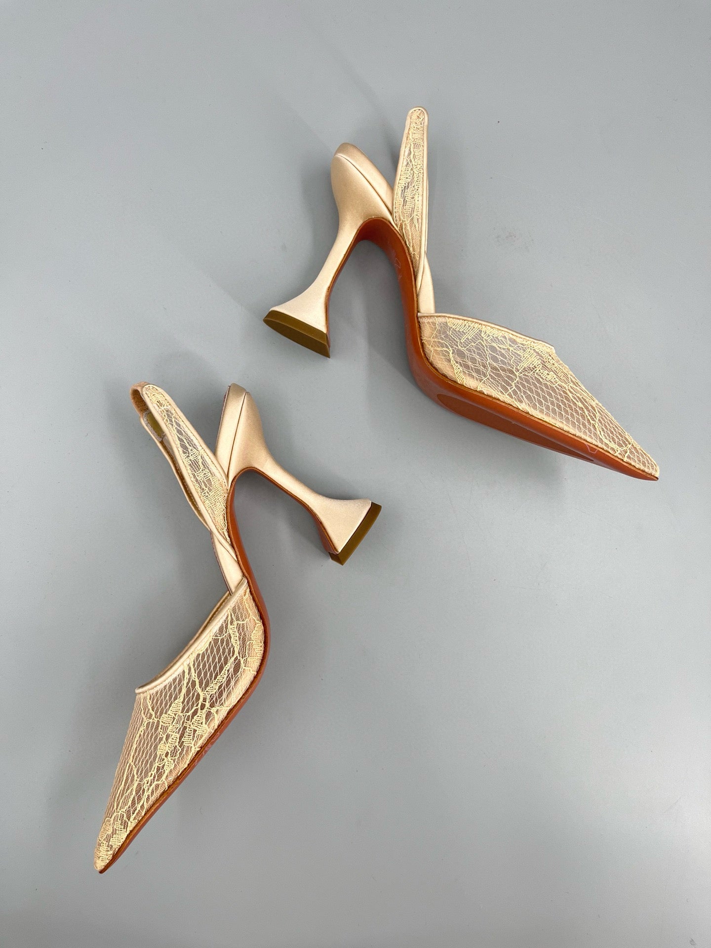 AMINA M HEELS