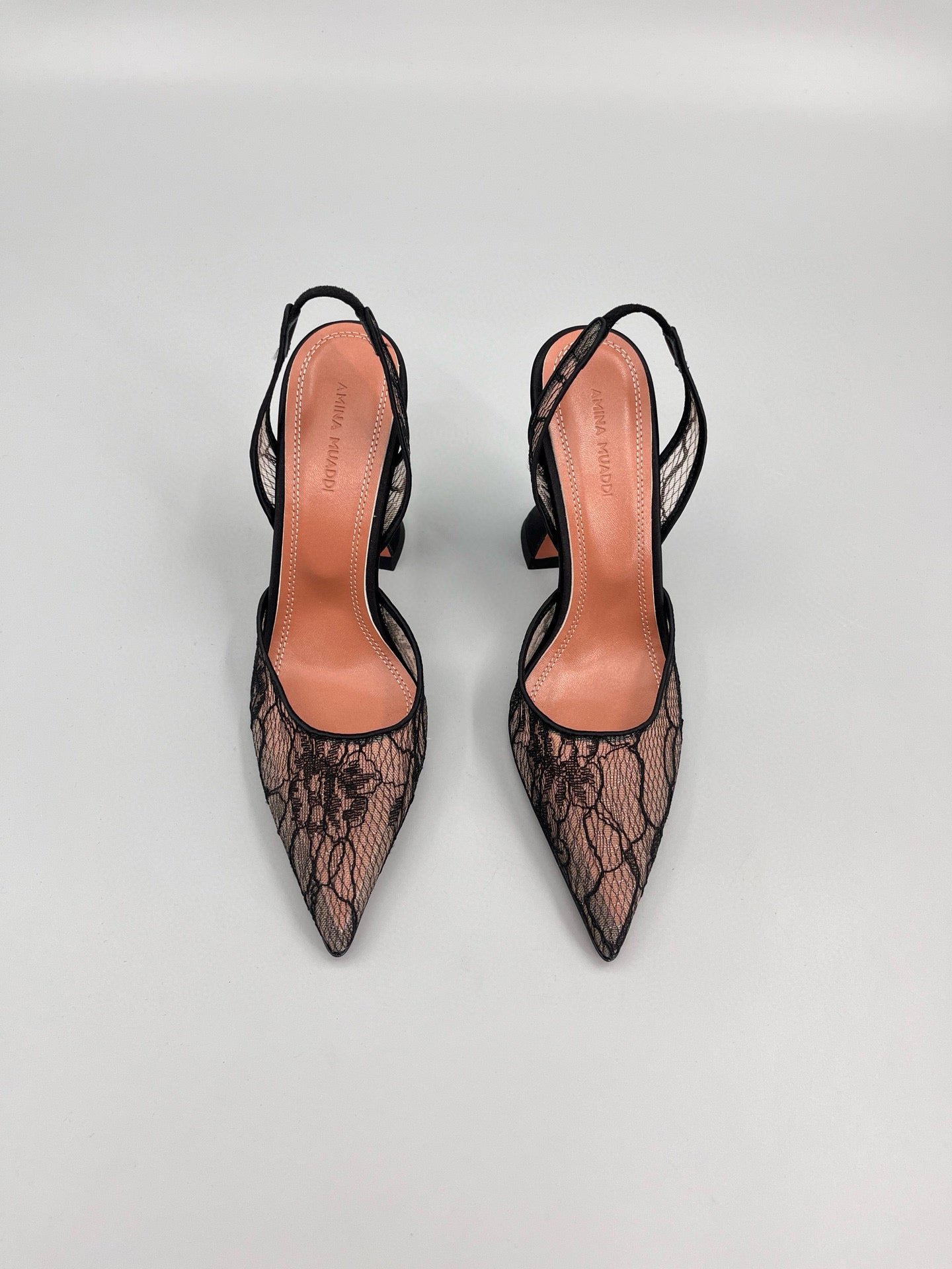 AMINA M HEELS