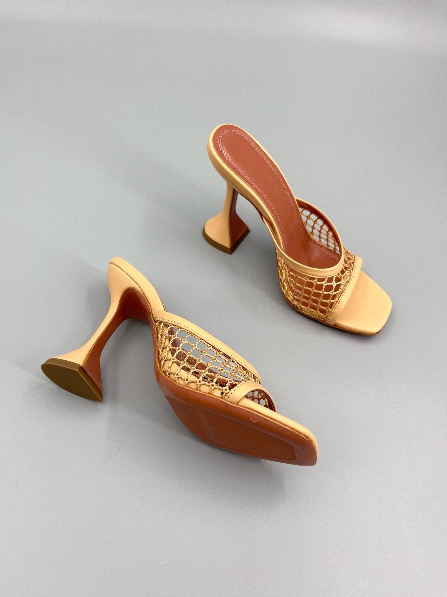 AMINA M HEELS