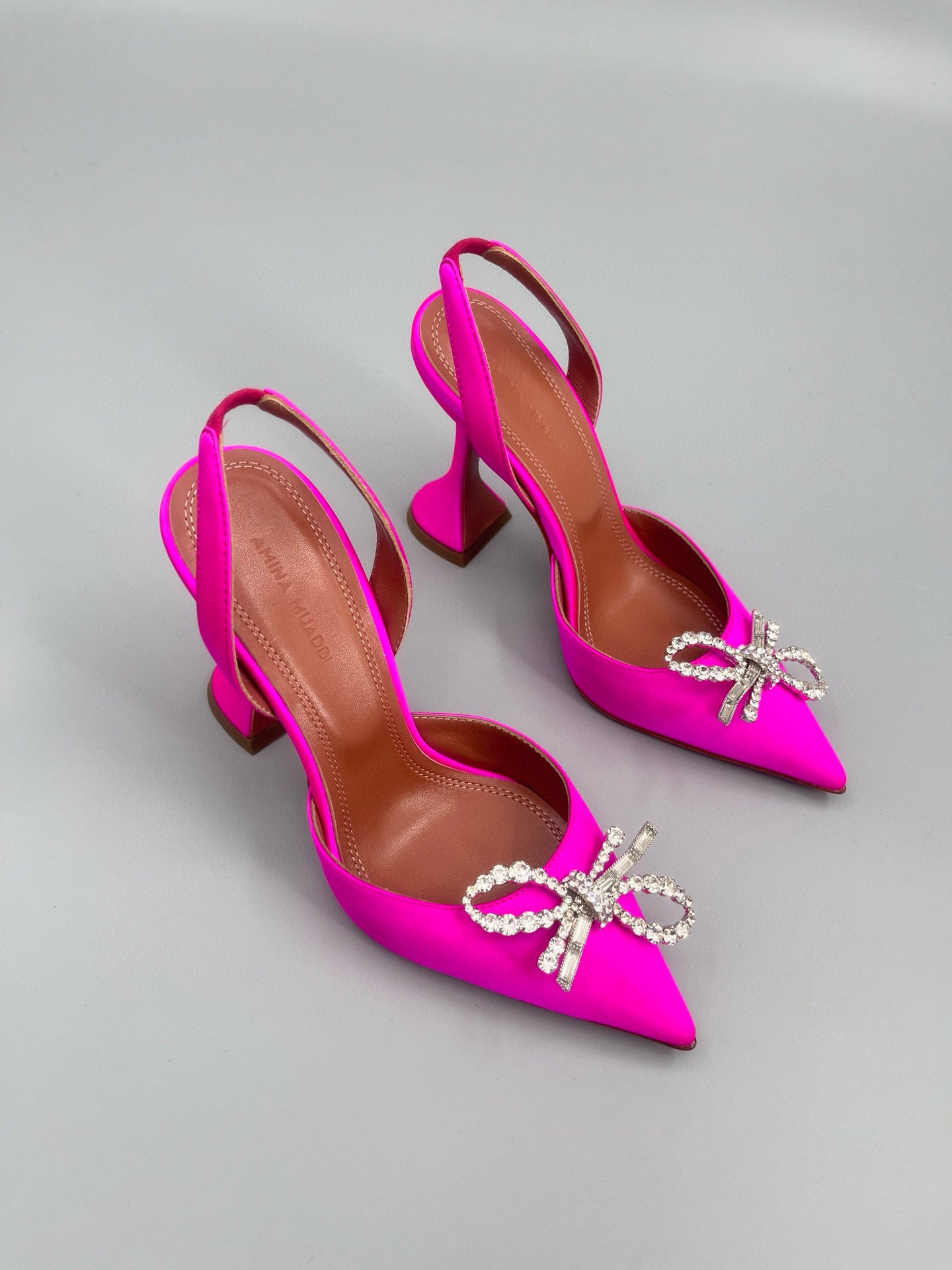 AMINA M HEELS