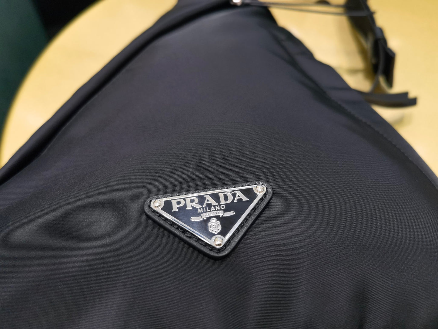 PD RE-NYLON AND LEATHER BACKPACK