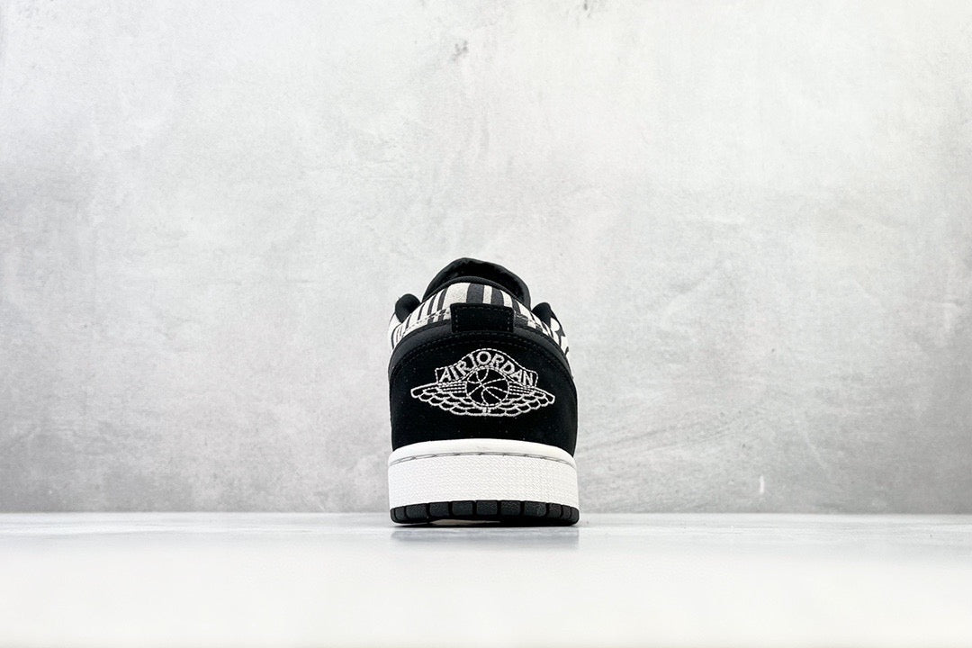 JORDAN 1 LOW ZEBRA