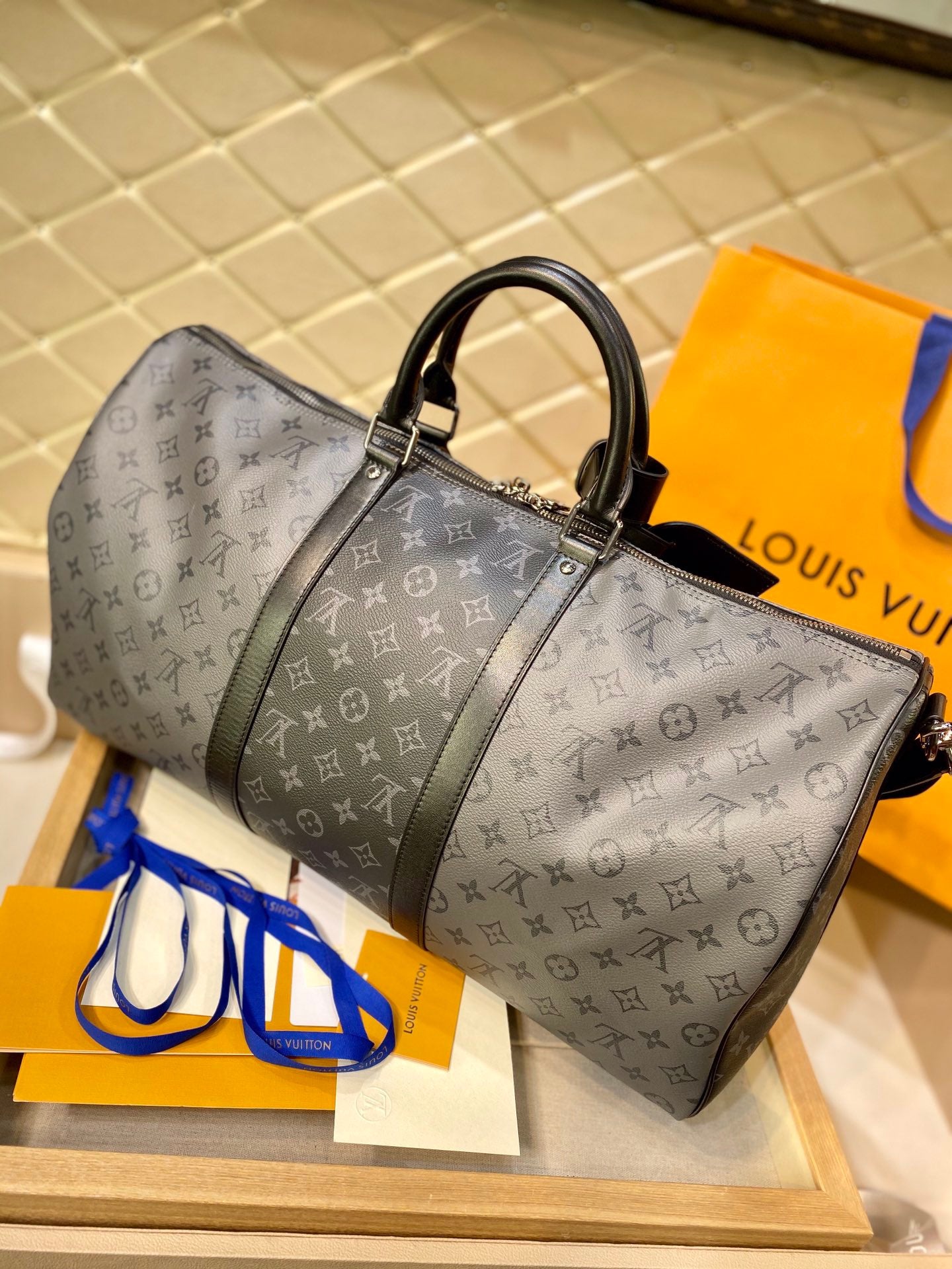 LOU KEEPALL BANDOULIÈRE 50 BAG