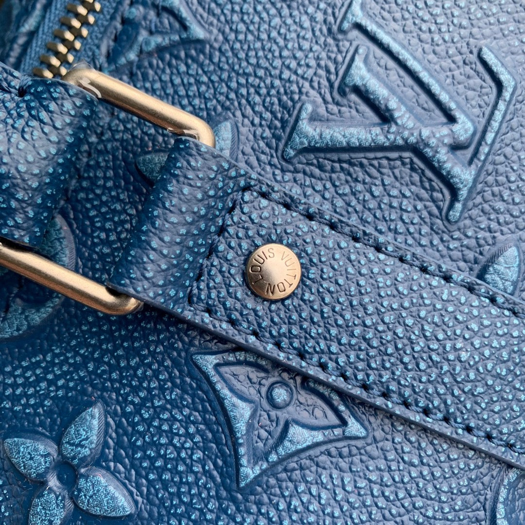 LOU KEEPALL BANDOULIÈRE 50 BAG