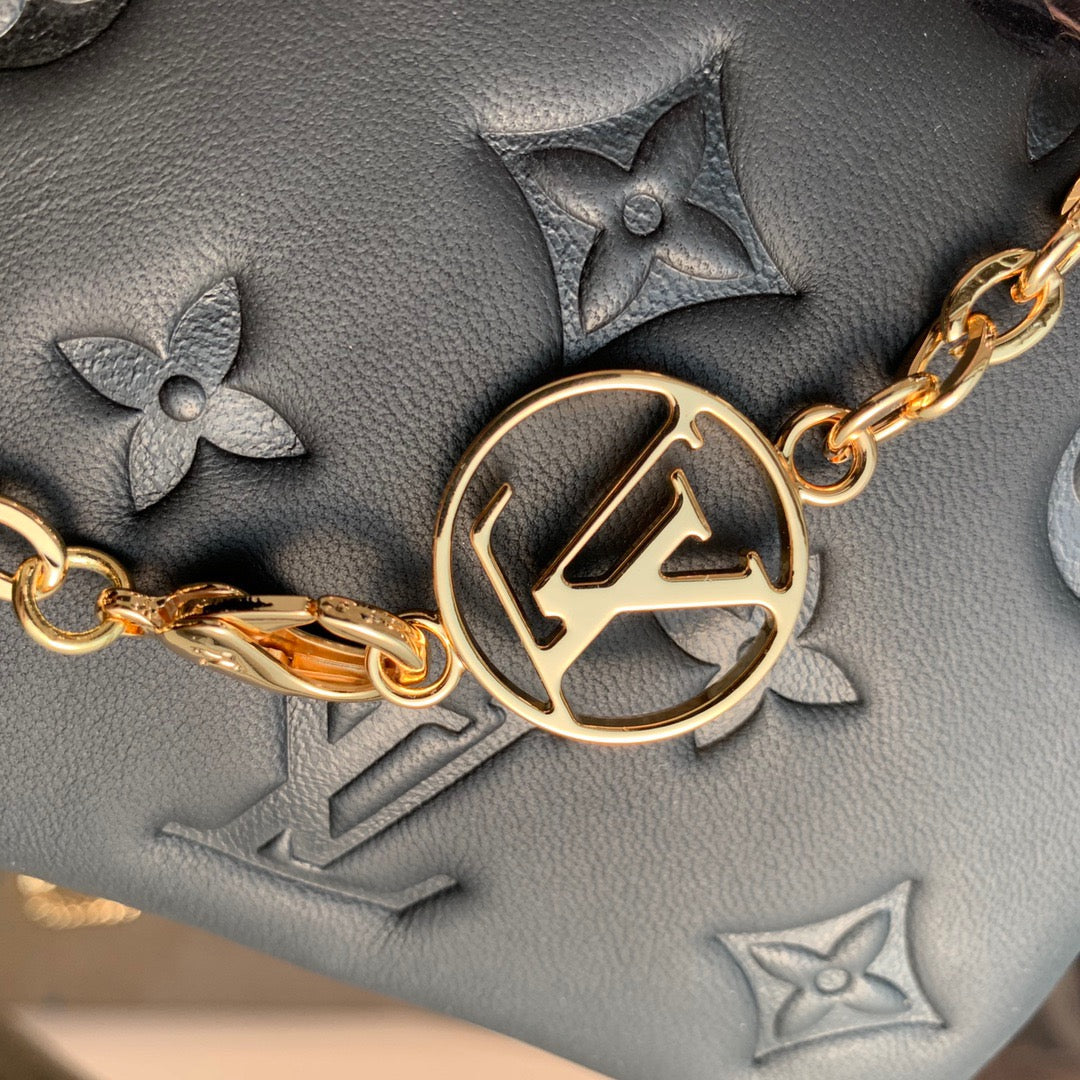 LOU BELTBAG COUSSIN