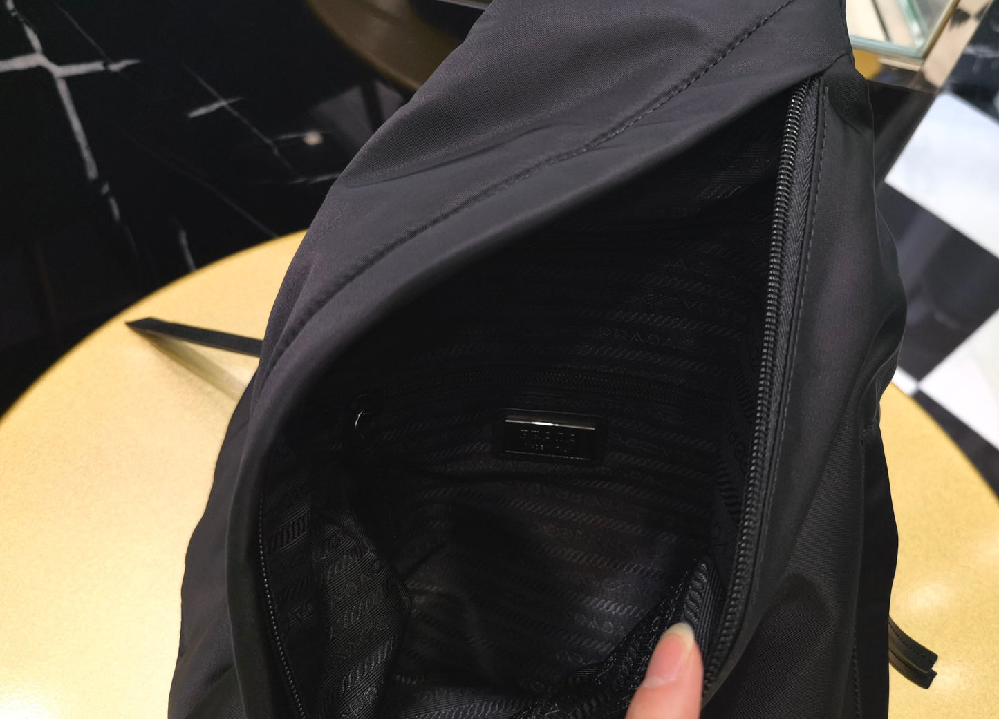 PD RE-NYLON AND LEATHER BACKPACK