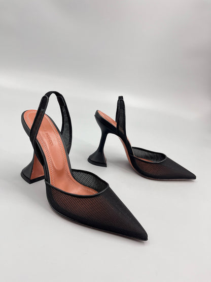 AMINA M HEELS