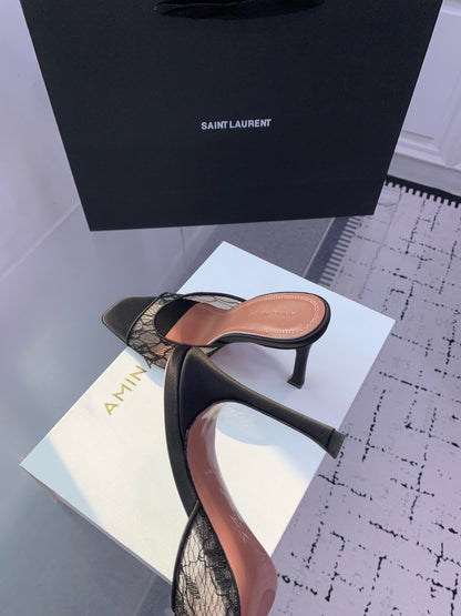 AMINA M HEELS