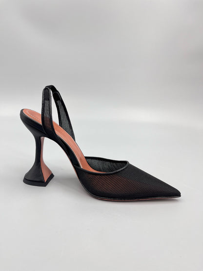 AMINA M HEELS