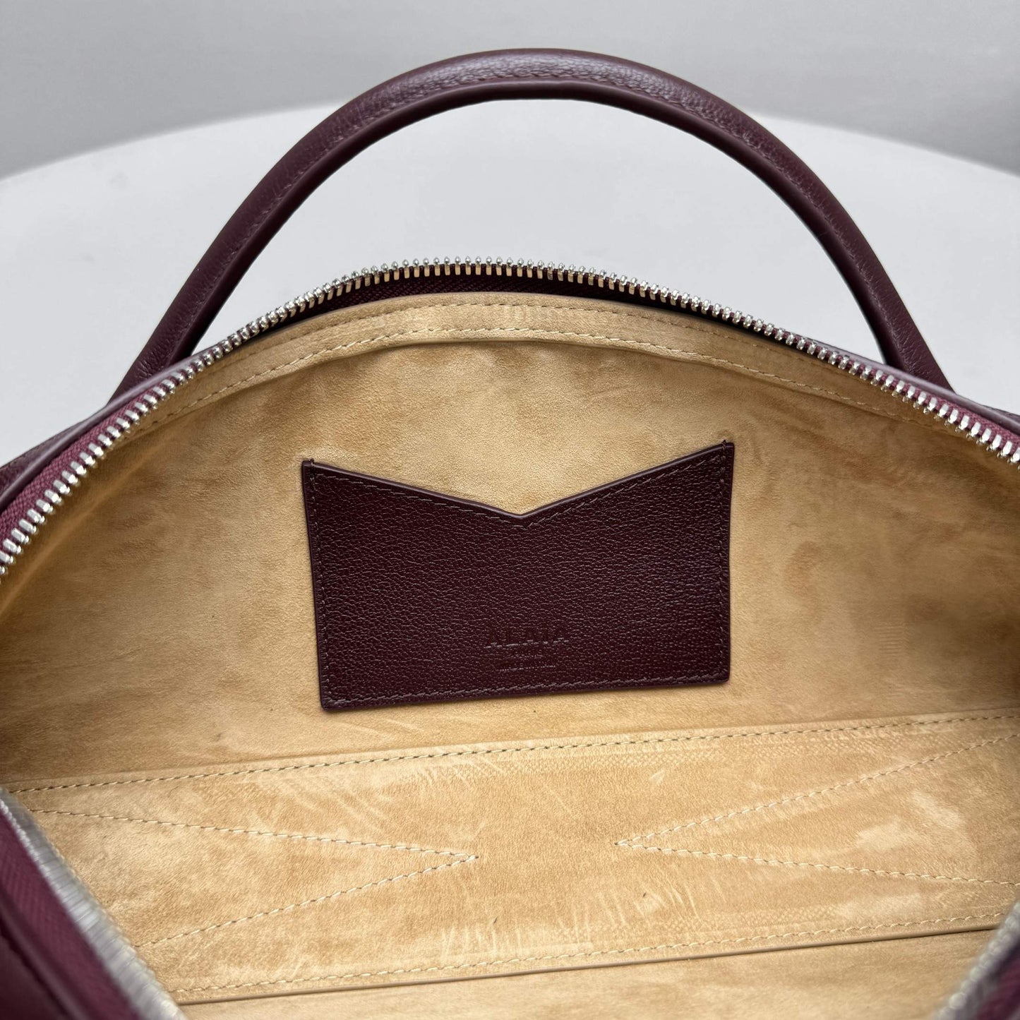 ALAIA LE TECKEL CLUTCH