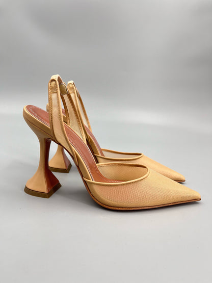 AMINA M HEELS