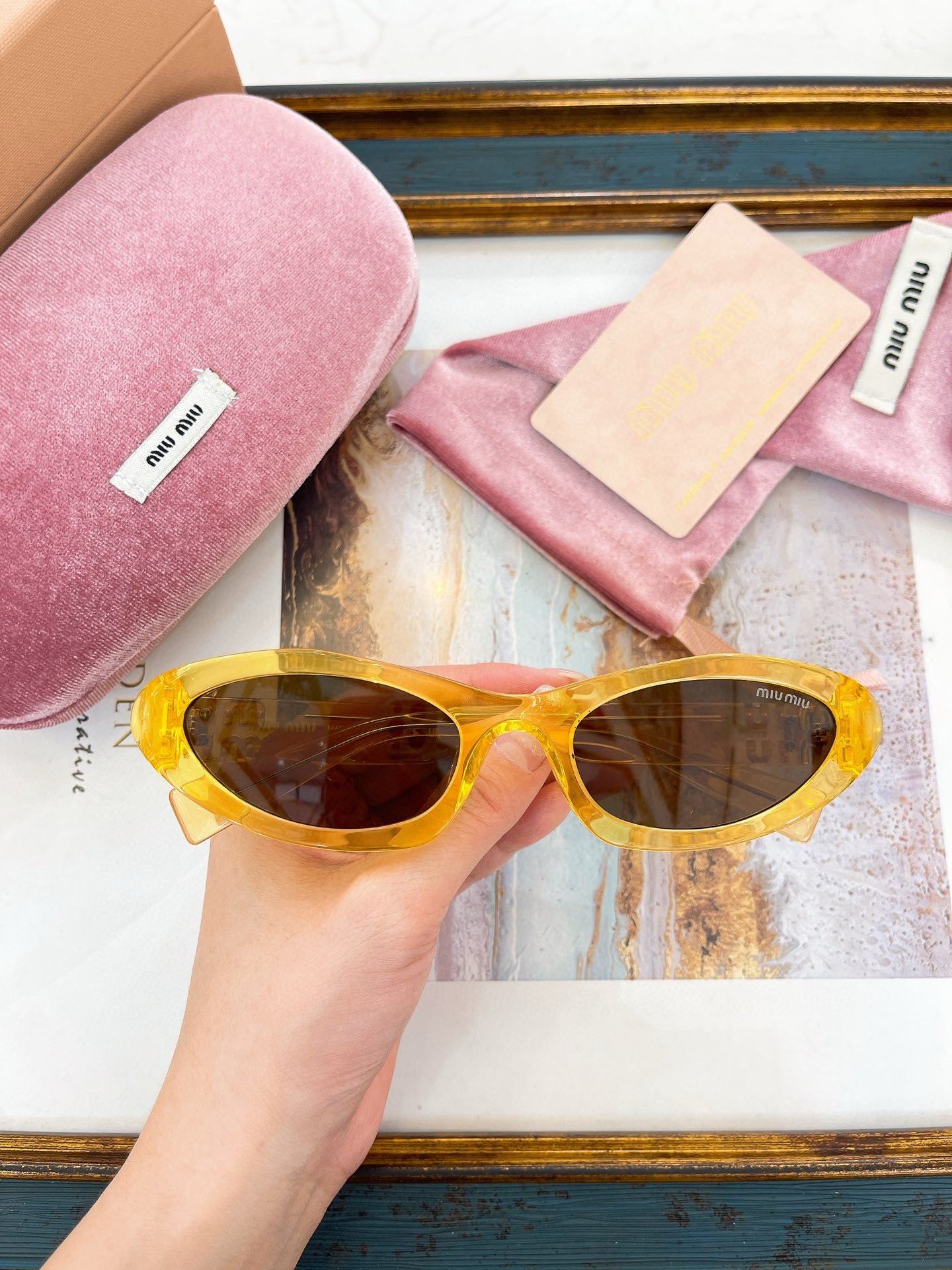 MIU M SUNGLASSES