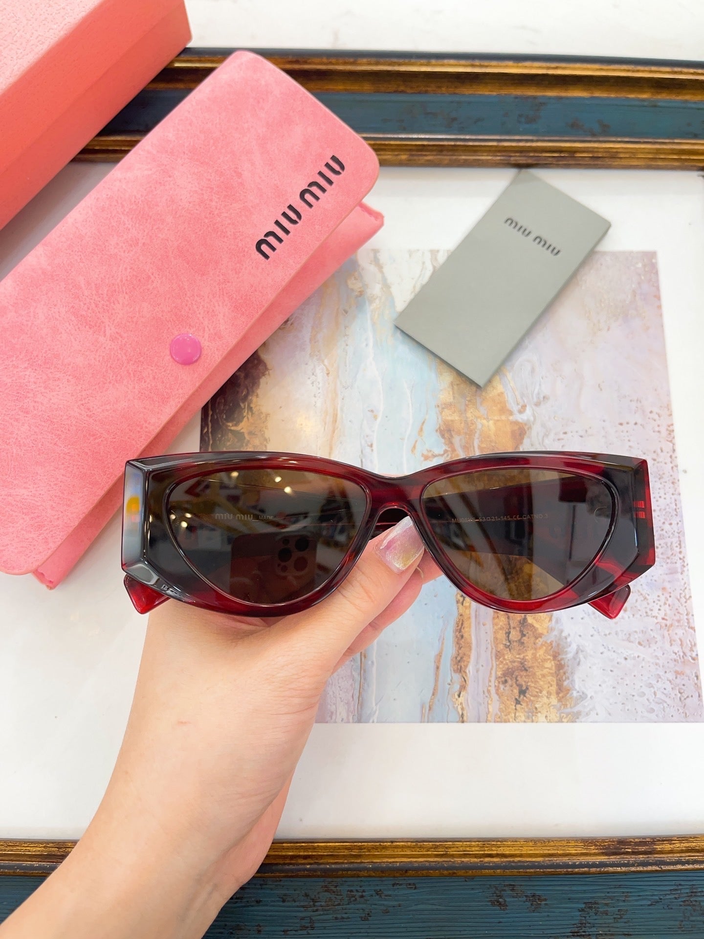 MIU M SUNGLASSES