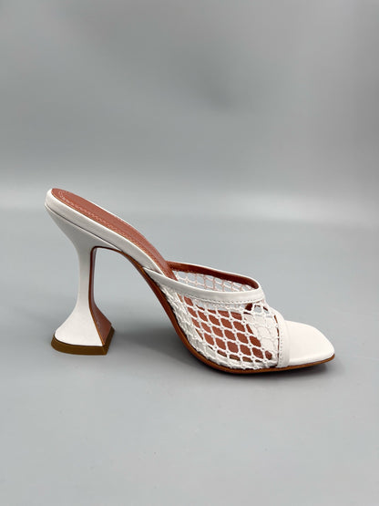 AMINA M HEELS