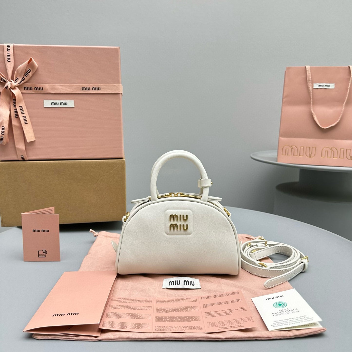 MIU M LEATHER TOP HANDLE BAG