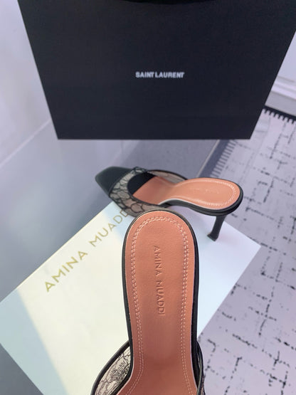 AMINA M HEELS