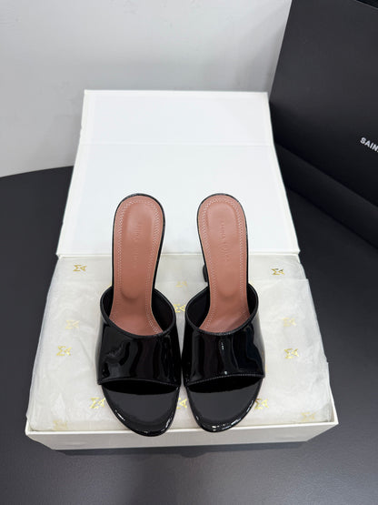 AMINA M HEELS