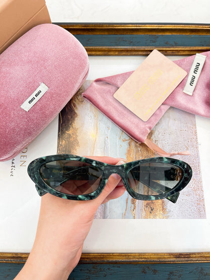 MIU M SUNGLASSES