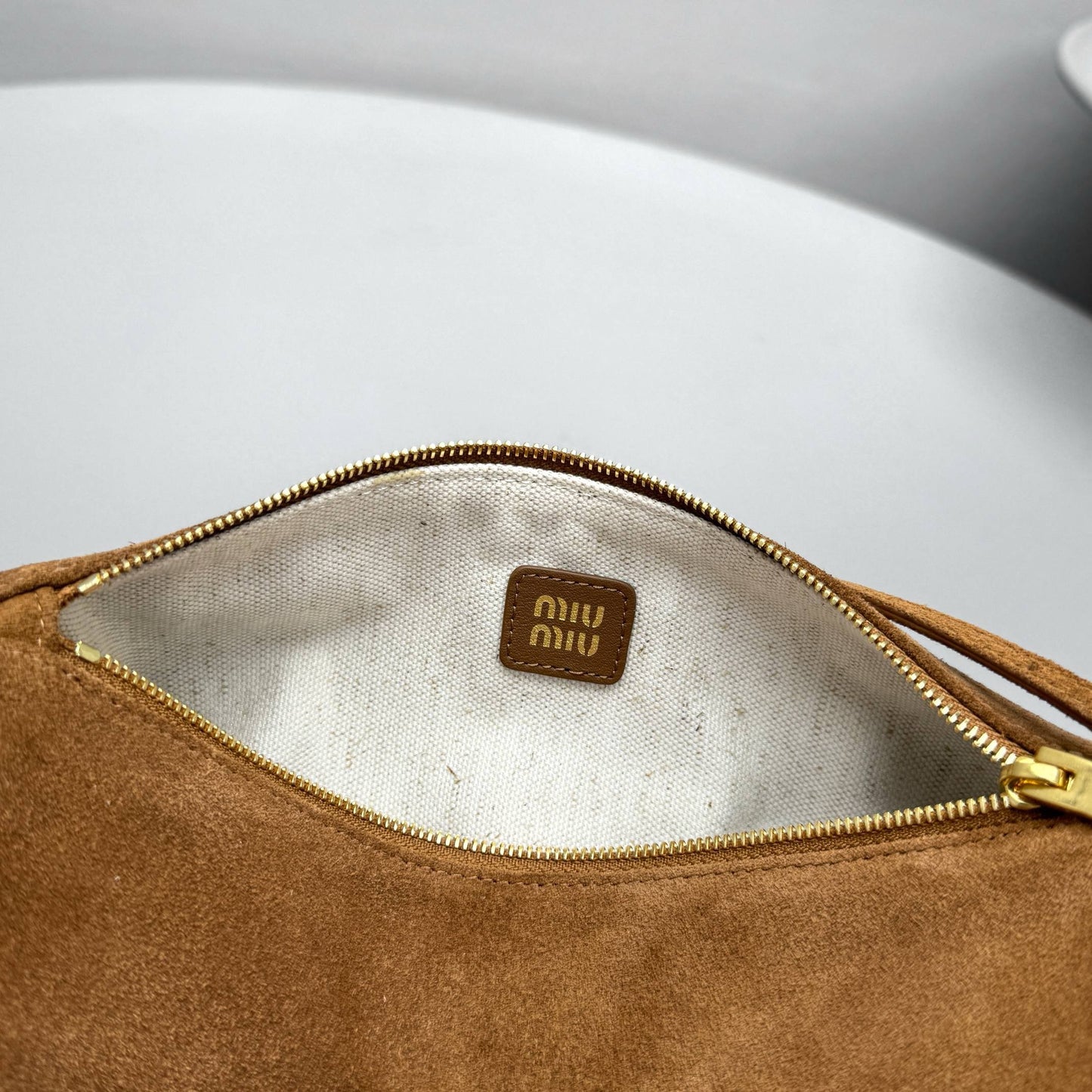 MIU M SUEDE POUCH