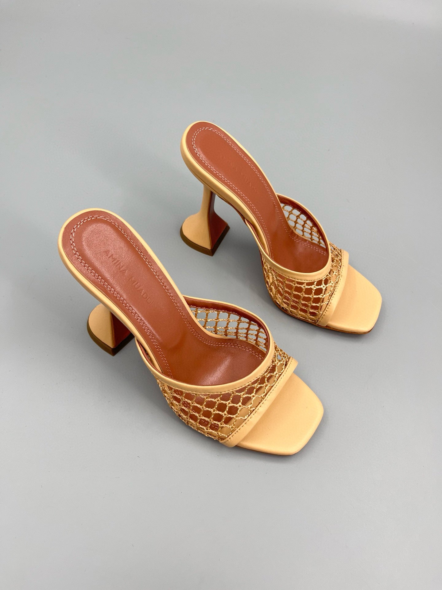 AMINA M HEELS