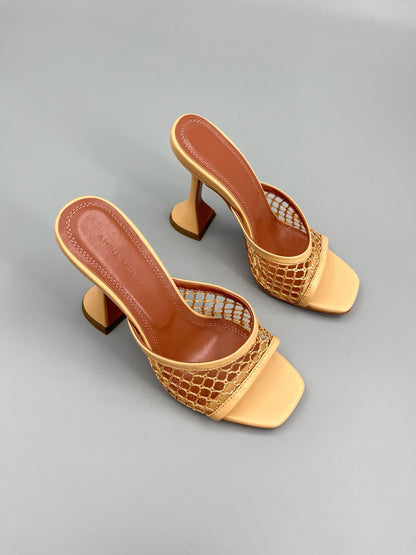 AMINA M HEELS