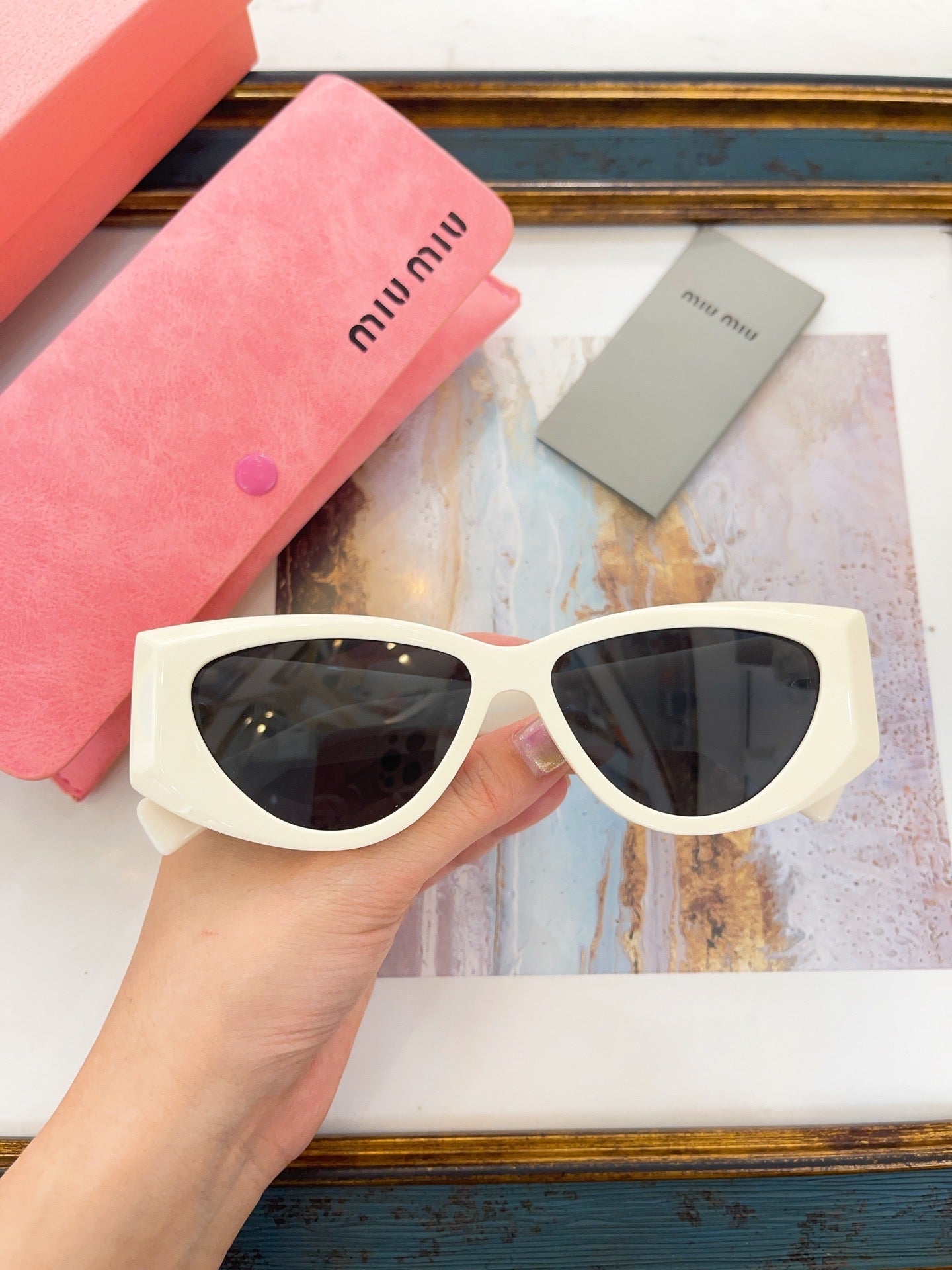 MIU M SUNGLASSES