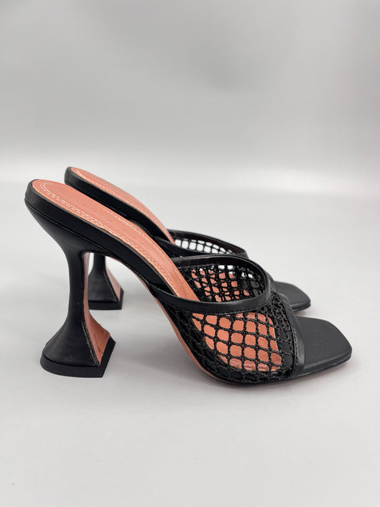 AMINA M HEELS
