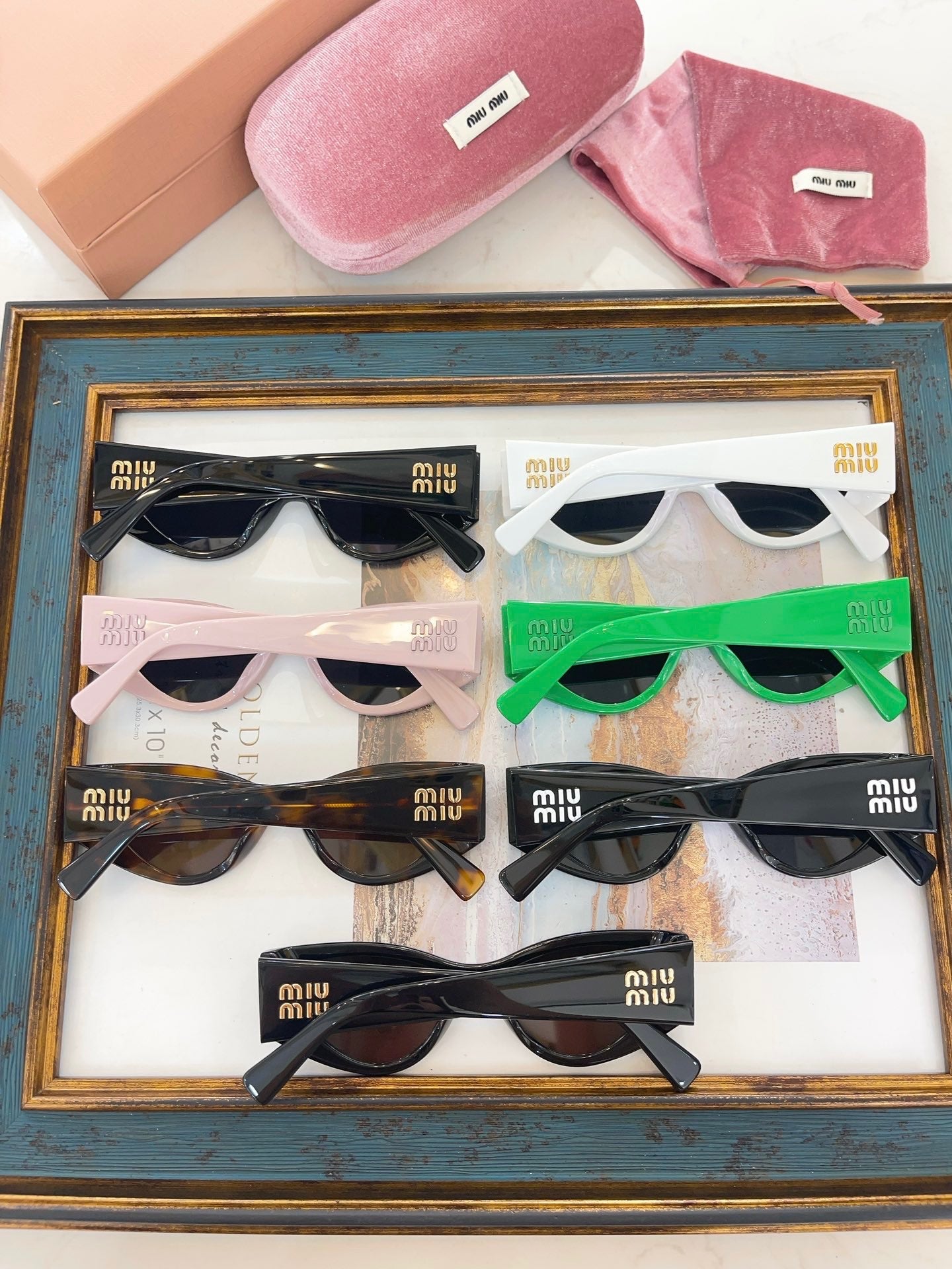 MIU M SUNGLASSES