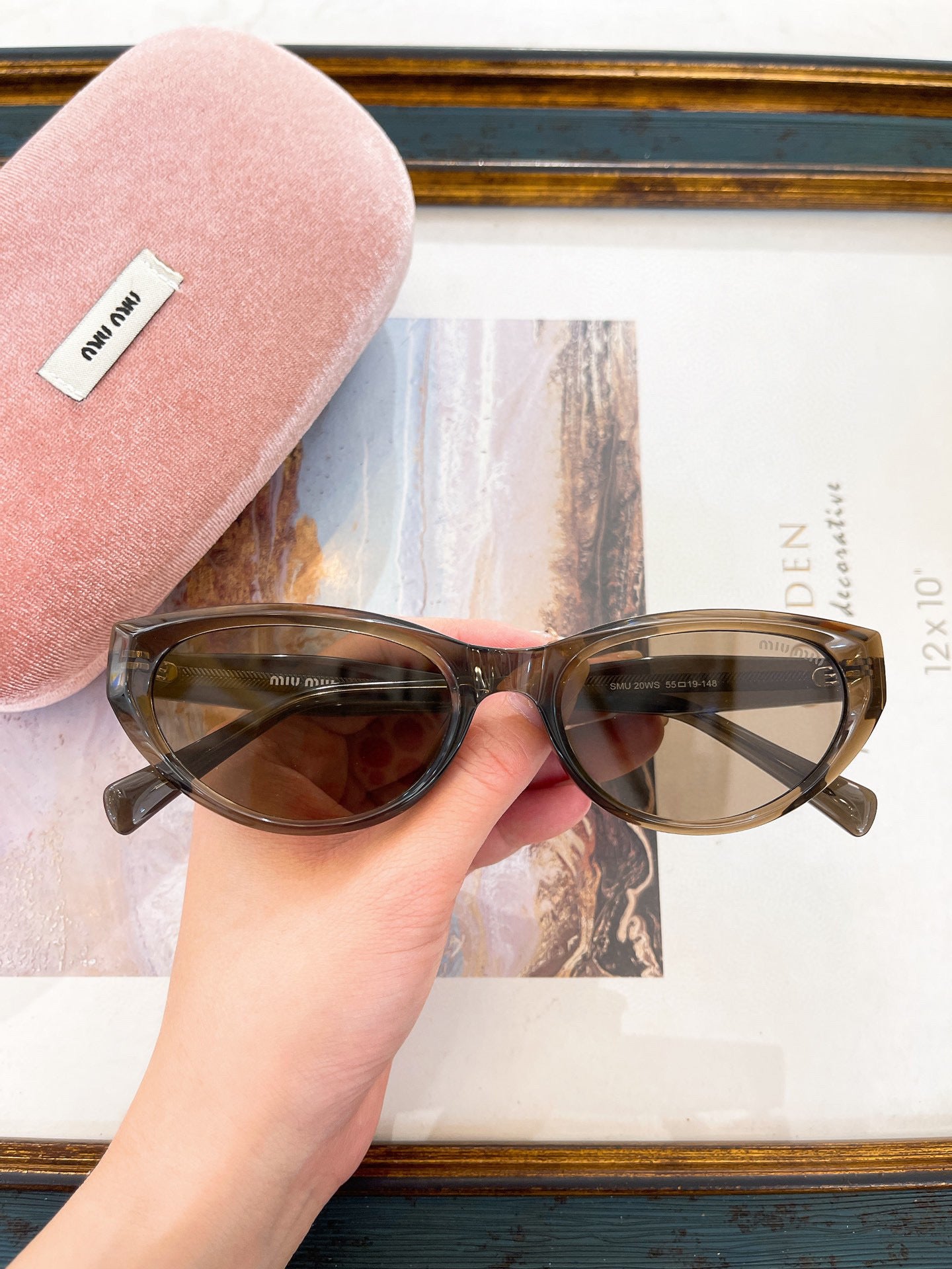 MIU M SUNGLASSES