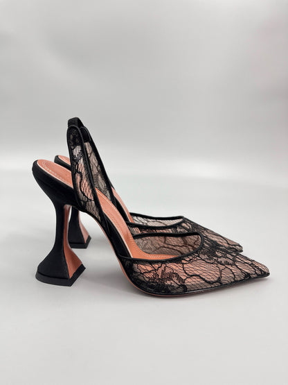 AMINA M HEELS