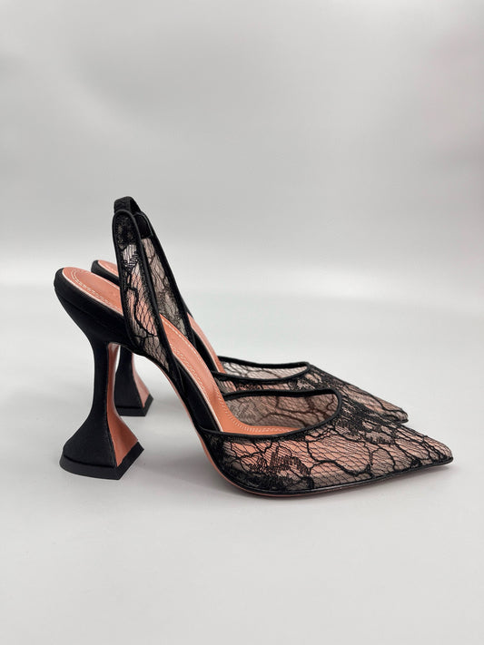 AMINA M HEELS