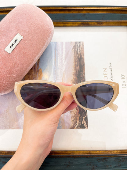 MIU M SUNGLASSES