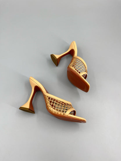 AMINA M HEELS