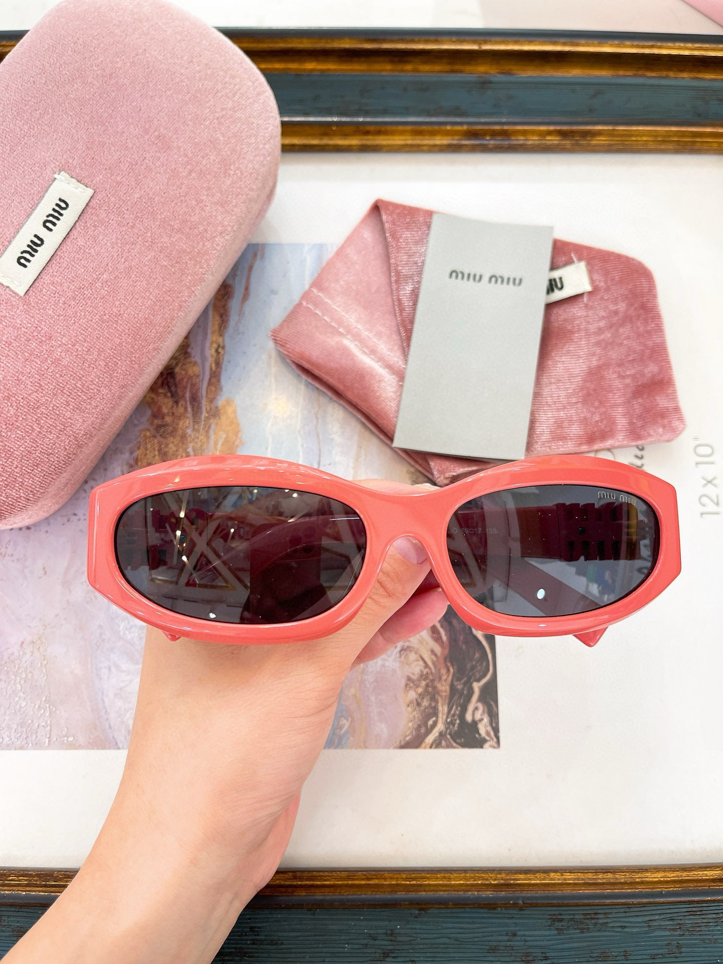 MIU M SUNGLASSES