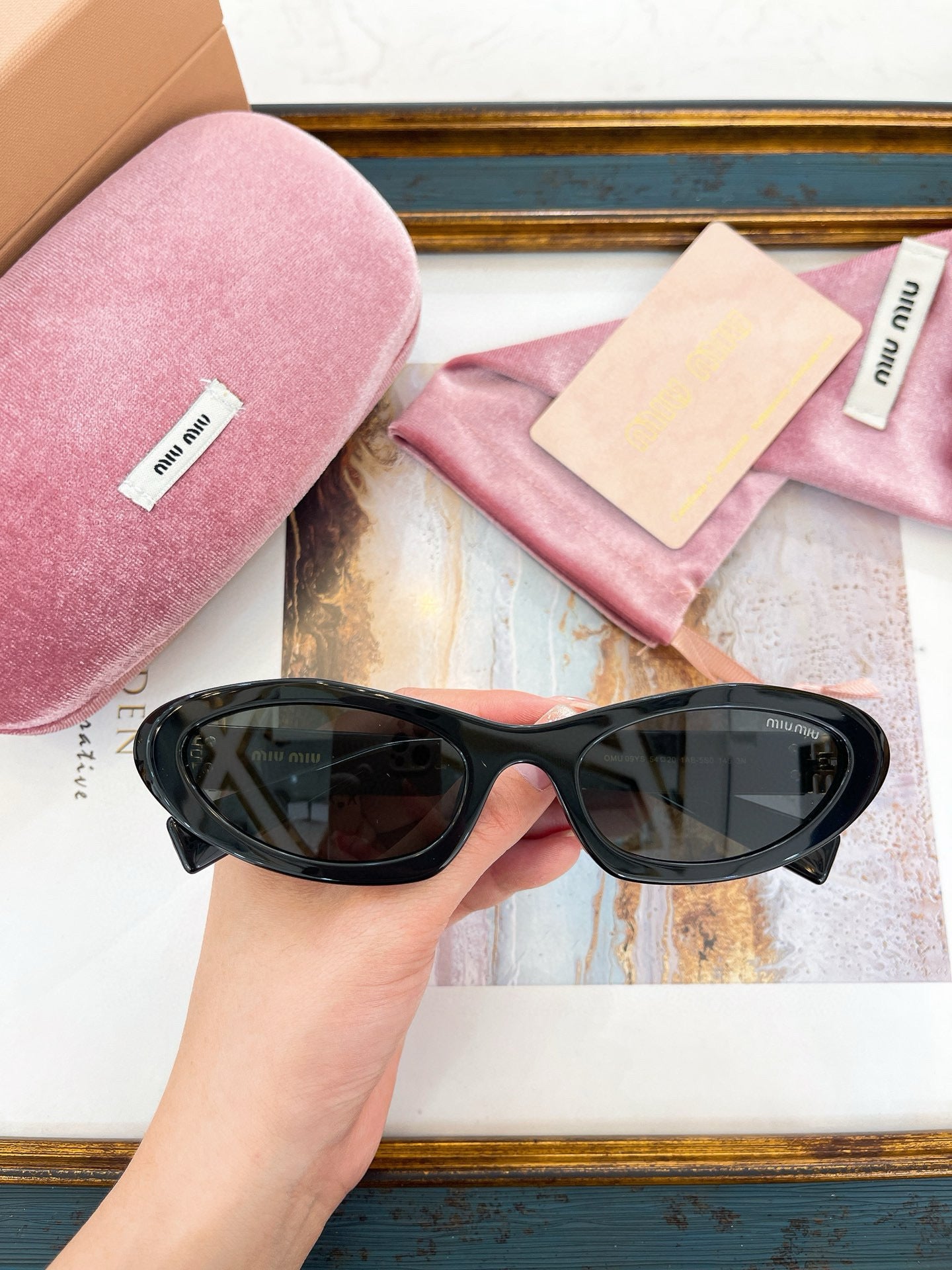 MIU M SUNGLASSES