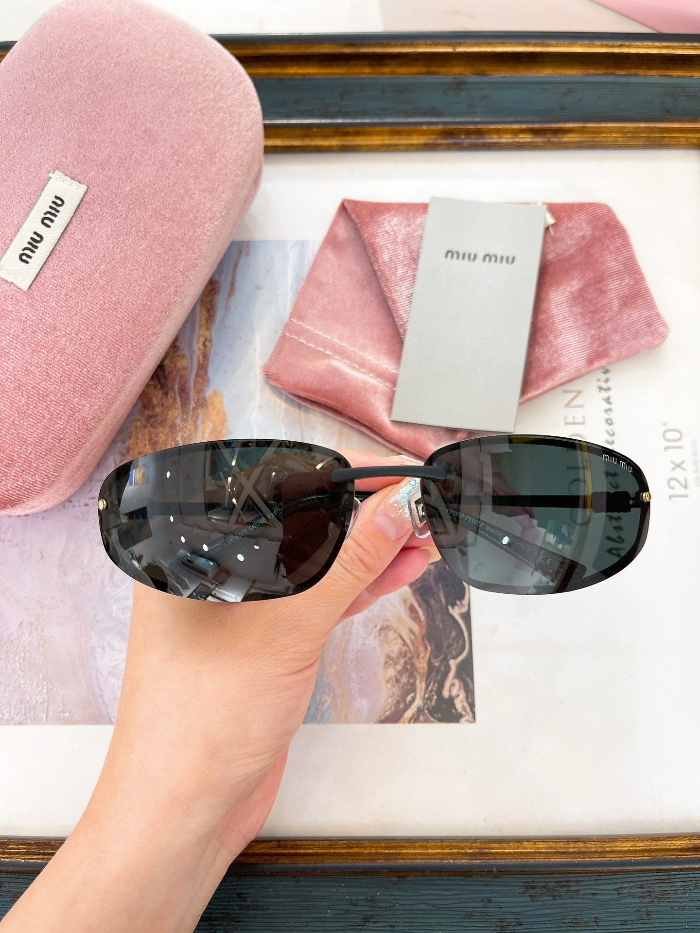 MIU M SUNGLASSES