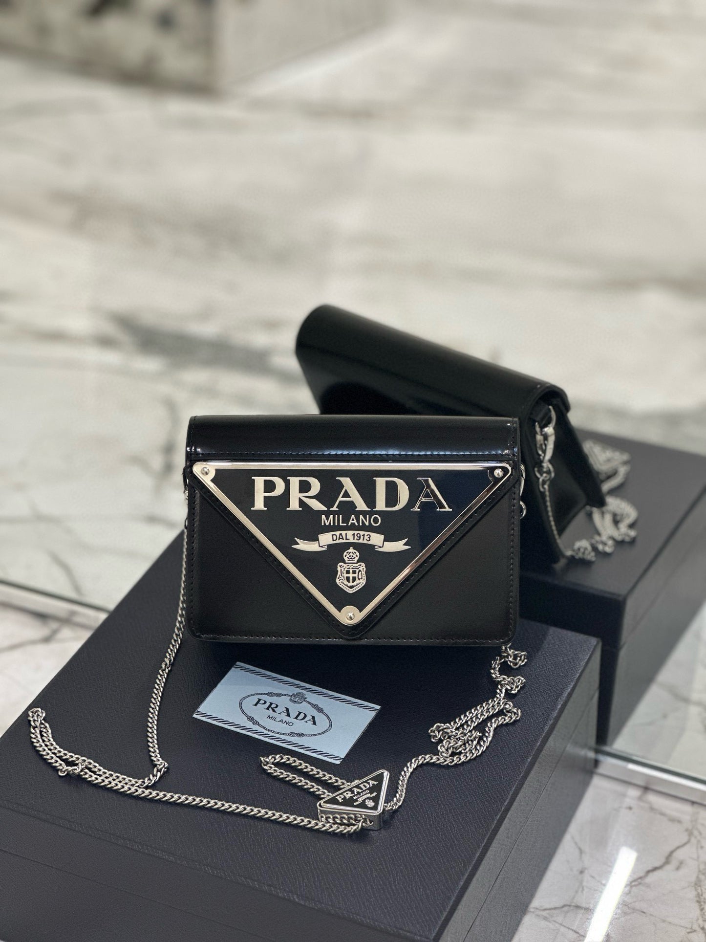 PD TRIANGLE LOGO BUFFED SHOULDER BAG