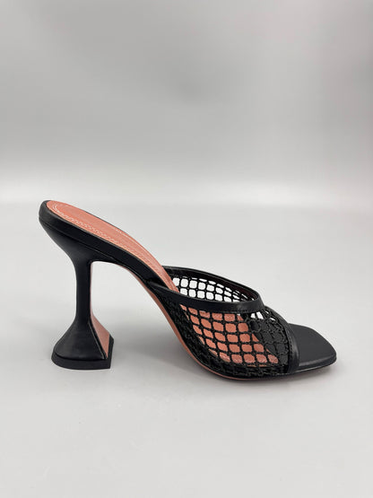 AMINA M HEELS