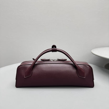 ALAIA LE TECKEL CLUTCH