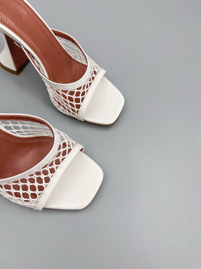 AMINA M HEELS