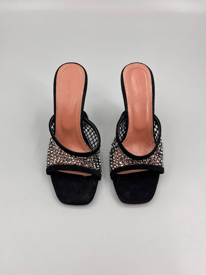 AMINA M HEELS