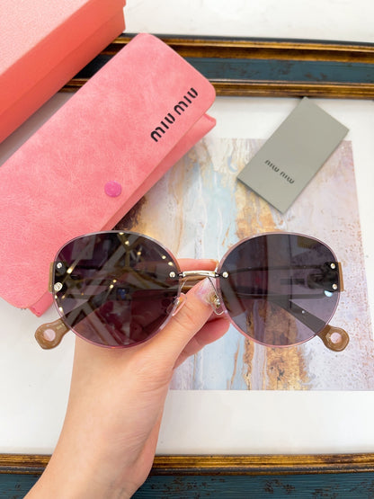 MIU M SUNGLASSES