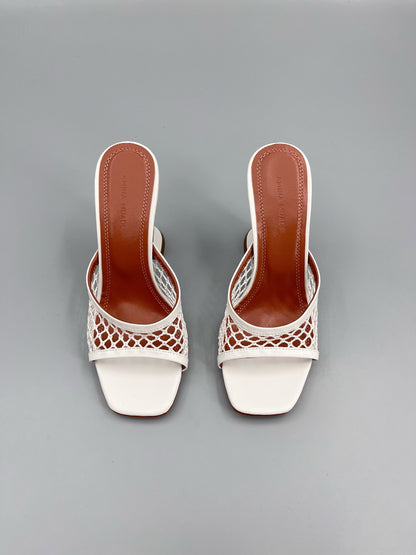 AMINA M HEELS
