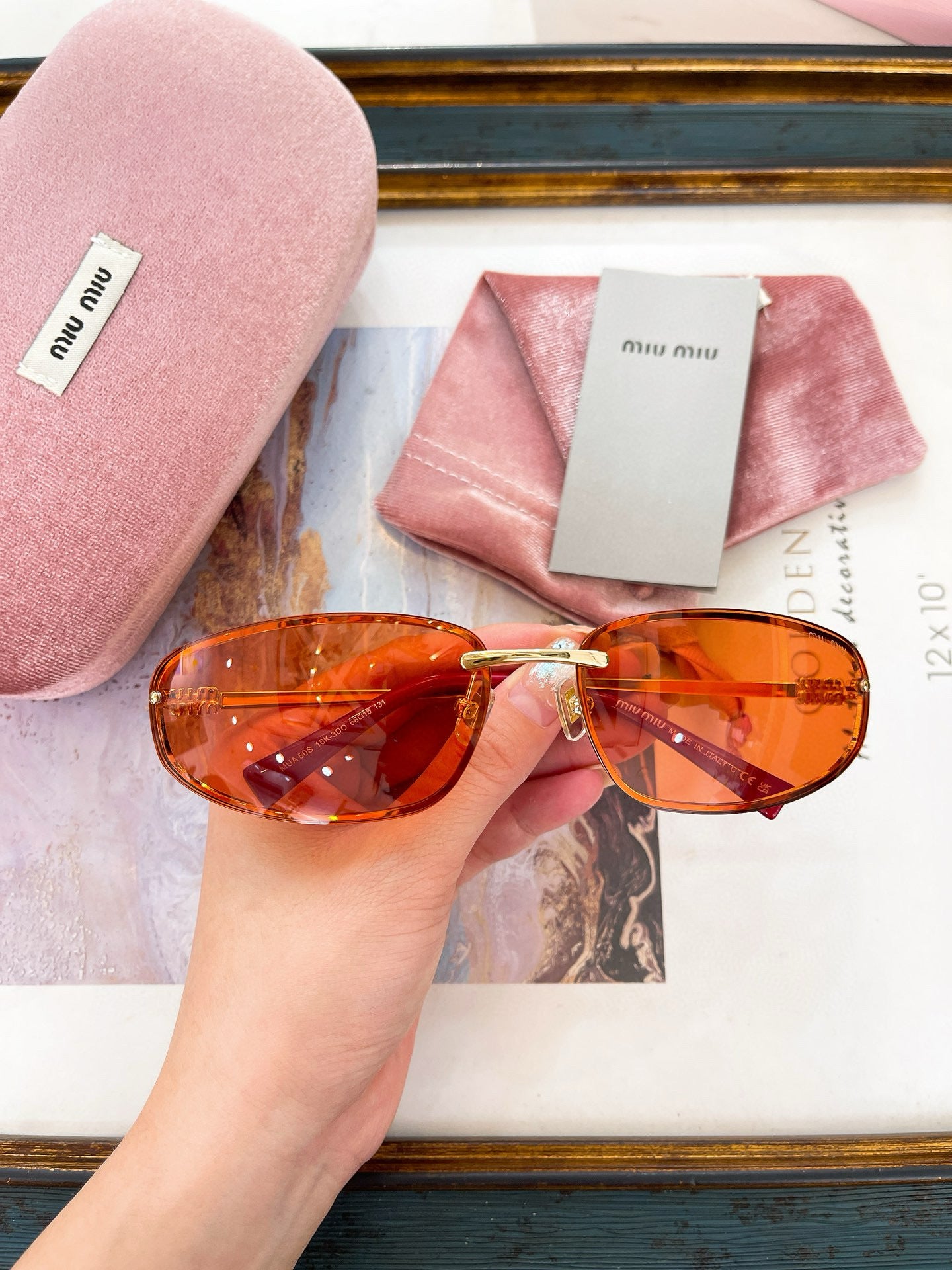 MIU M SUNGLASSES