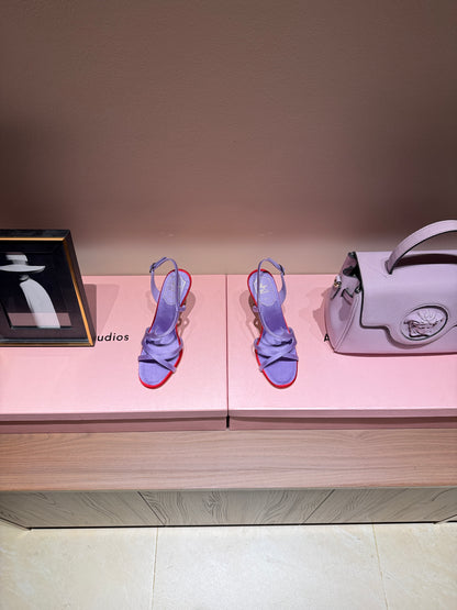 ROGER V HEELS